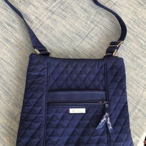 Navy blue Vera Bradley cross body bag.